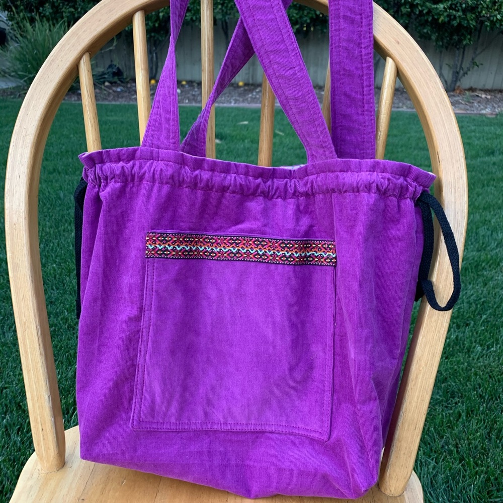Handmade purple tote bag with drawstring